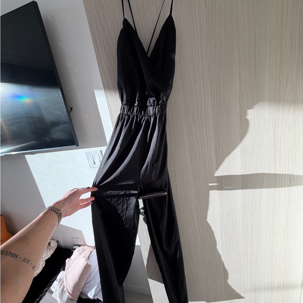 by the way. Black Jumpsuit